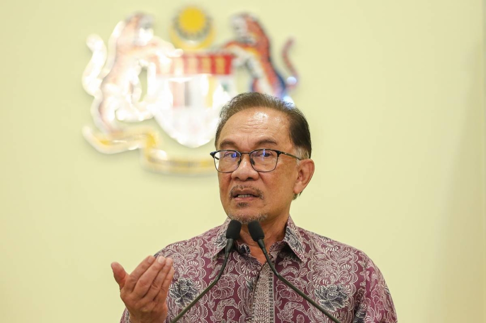 Prime Minister Datuk Seri Anwar Ibrahim speaks during a press conference at Prime Minister Office in Putrajaya November 27, 2022. ― Picture by Yusof Mat Isa