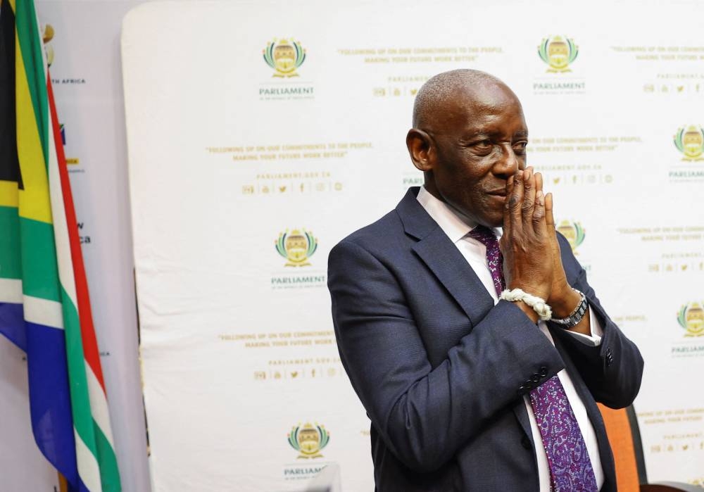South Africa's former Chief Justice Sandile Ngcobo gestures ahead of the handing over of the report on whether or not President Cyril Ramaphosa should face an impeachment inquiry over the Phala Phala saga in Cape Town, South Africa, November 30, 2022.— Reuters pic