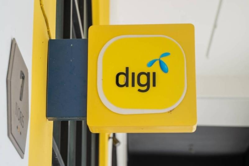 Digi.Com Bhd’s (Digi) shareholders have approved the proposed merger with Celcom Axiata Bhd. — Picture by Devan Manuel