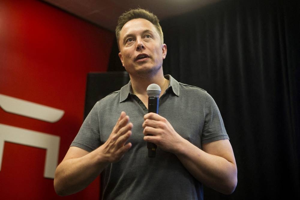 Elon Musk said on Wednesday a wireless device developed by his brain chip company Neuralink is expected to begin human clinical trials in six months. — Reuters pic