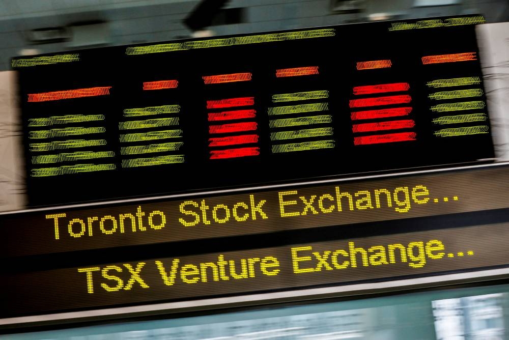 A sign board displaying Toronto Stock Exchange (TSX) stock information is seen in Toronto June 23, 2014. — Reuters pic