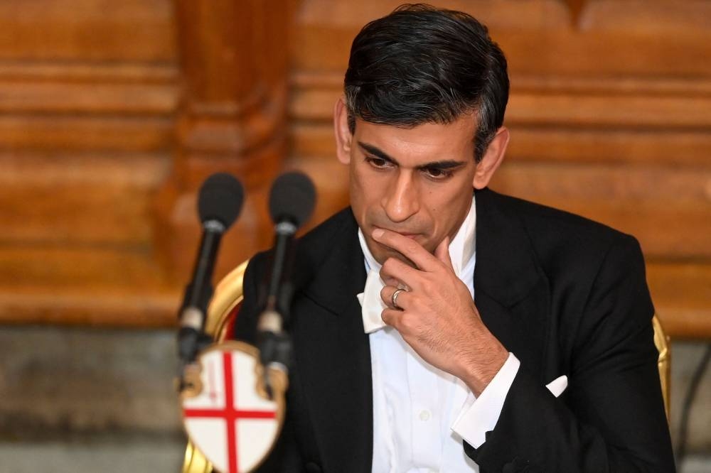 British Prime Minister Rishi Sunak looks on during the annual Lord Mayor's Banquet at Guildhall, in London November 28, 2022. — Reuters pic