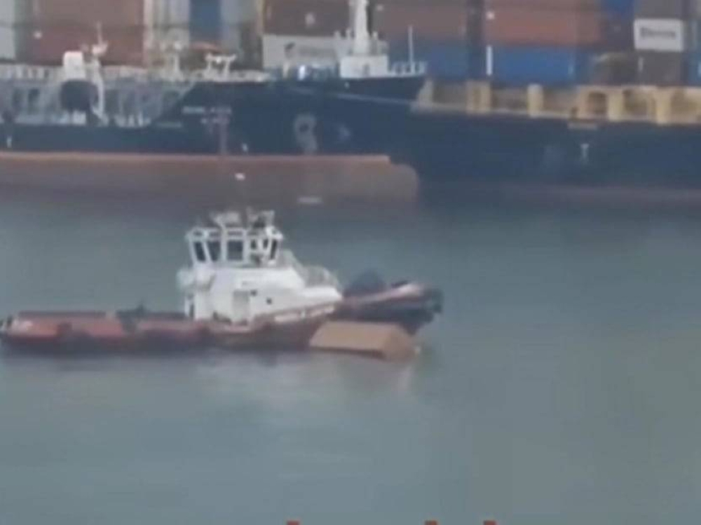 In a video on the Sg.incidents Instagram account, a patrol craft can be seen retrieving a freight container in the sea. — Picture via Instagram/ Sg.incidents