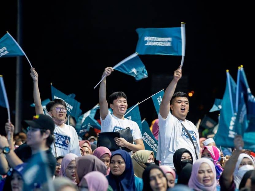 Young people at a Perikatan Nasional rally at Pagoh, Johor, Nov 17, 2022. The big divide in the youth vote has contributed to what experts have described as a “new stage in Malaysian politics” that is more fractured than ever. — TODAY pic