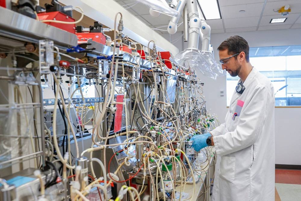 Adam Thompson, senior scientist, works at LanzaTech lab on November 28, 2022, in Skokie, Illinois. — AFP pic 
