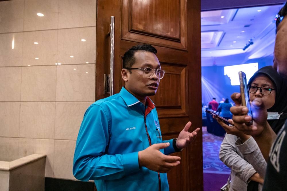 File picture shows Nik Nazmi Nik Ahmad speaking to reporters at PKR Setiawangsa fundraising dinner at Flamingo Hotel in Ampang on October 29, 2022. — Picture by Firdaus Latif