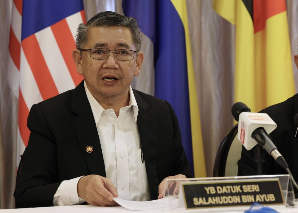 Domestic Trade and Cost of Living Minister Datuk Seri Salahuddin Ayub speaks to the press at his first media conference at his ministry in Putrajaya, December 5, 2022. — Bernama pic  