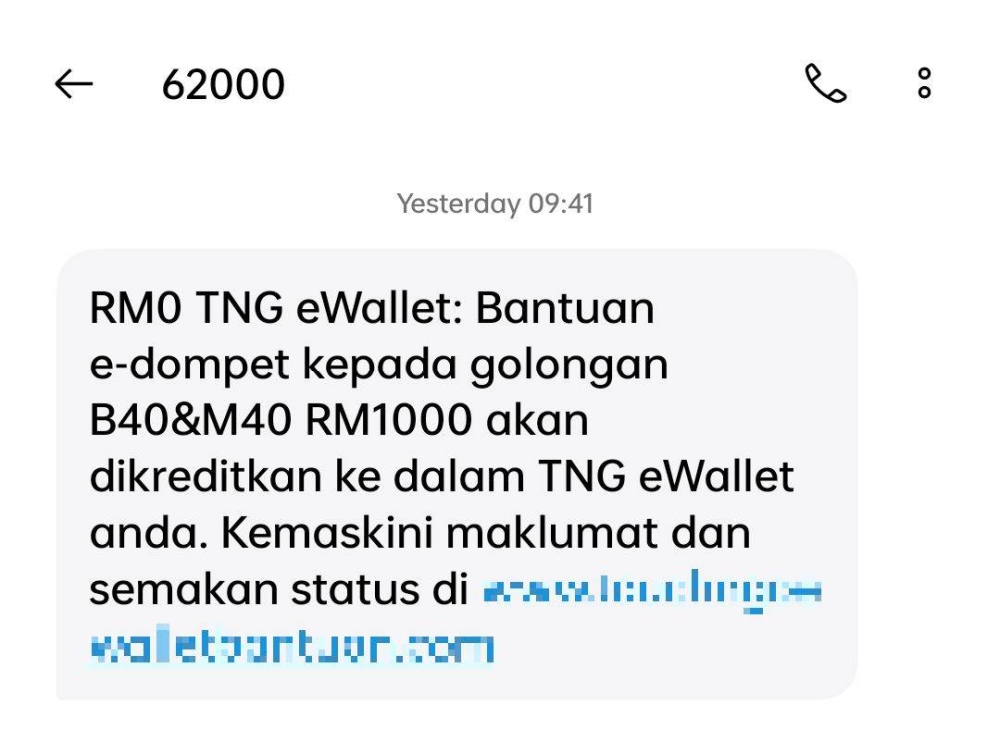 Screenshot of the text message offering RM1,000 financial aid via Touch 'n Go e-wallet.