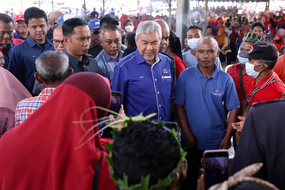 Deputy Prime Minister Datuk Seri Ahmad Zahid Hamidi greets members of the public in Rompin December 6, 2022. — Bernama pic 