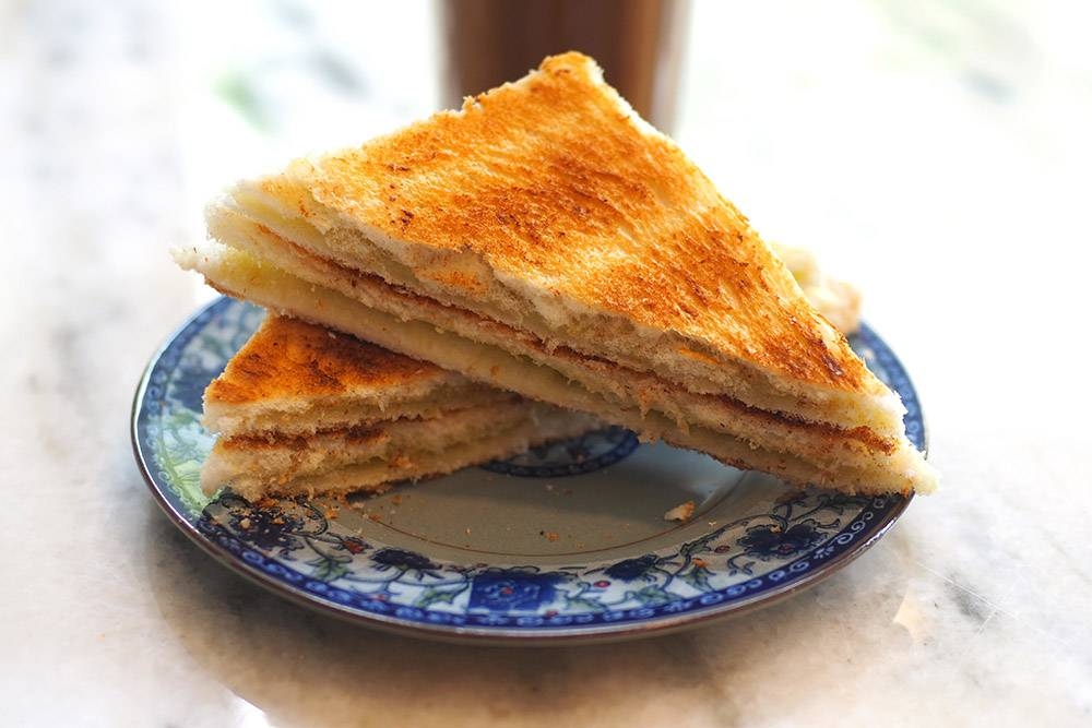 For breakfast, you can enjoy kaya toast with your cup of coffee.