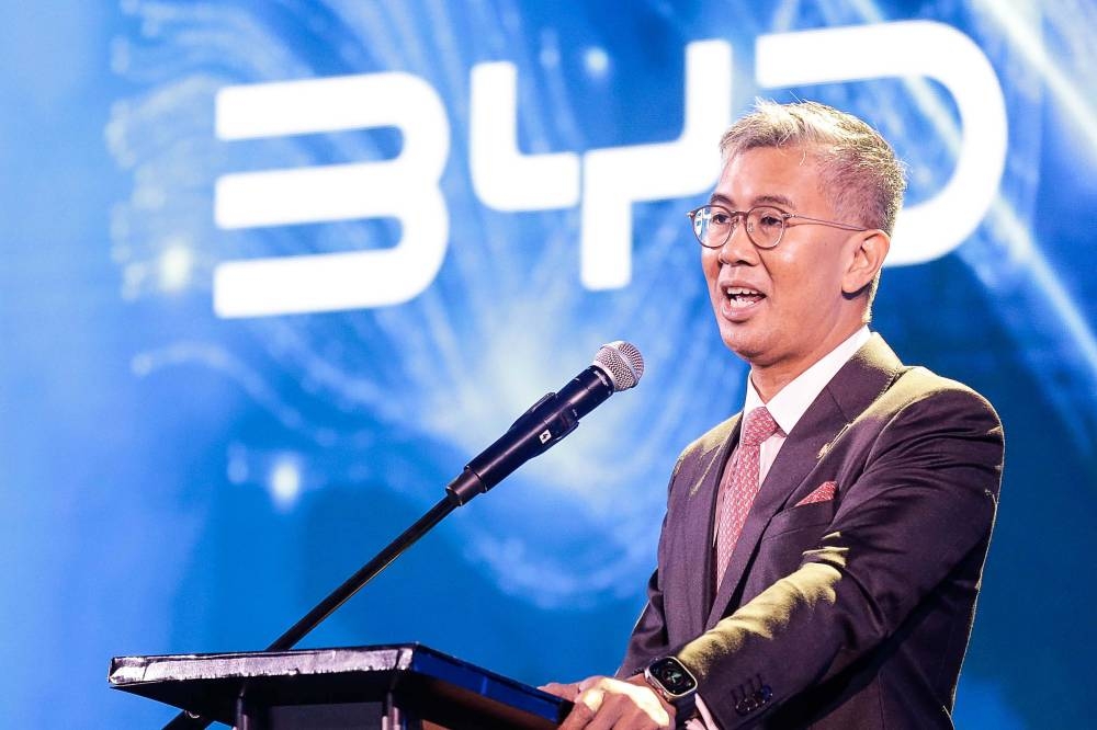 Minister of International Trade and Industry Datuk Seri Tengku Zafrul Abdul Aziz deliver a speech during the unveilling of electric vehicles at Bandar Malaysia in Sungai Besi December 8, 2022. ― Picture by Sayuti Zainudin