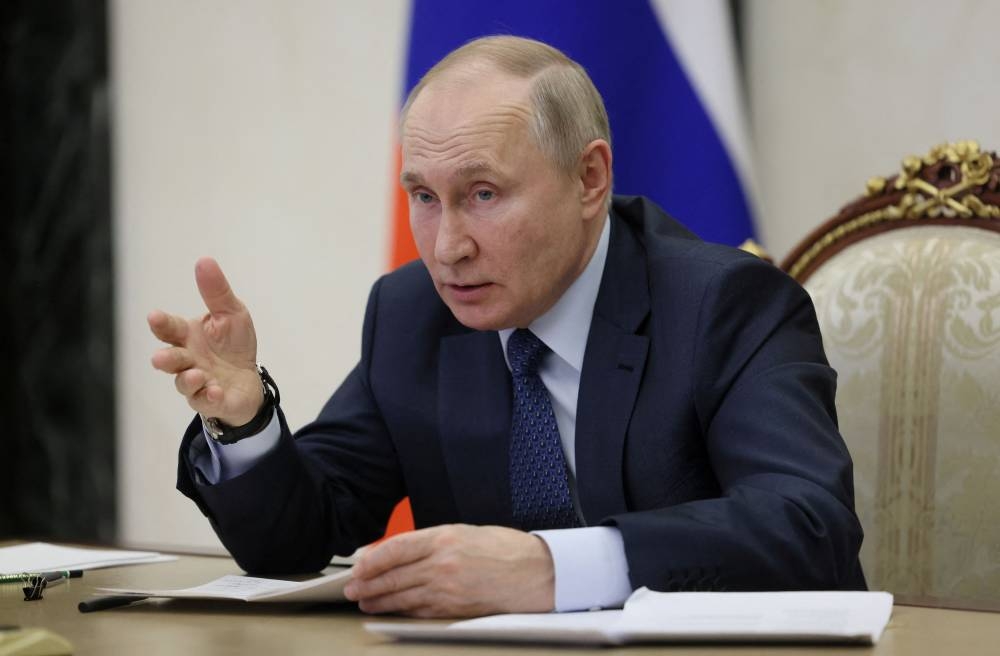 Russian President Vladimir Putin holds the annual meeting of the Presidential Council for Civil Society and Human Rights, via video link in Moscow, Russia December 7, 2022. — Mikhail Metzel/Sputnik handout pic via Reuters