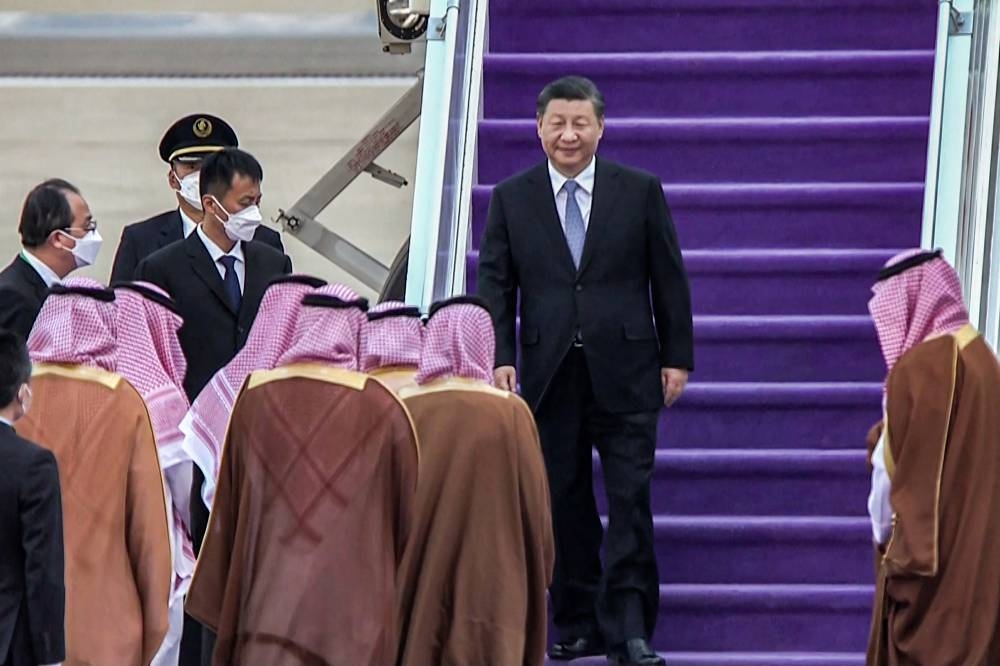 Hours after Chinese President Xi Jinping’s arrival yesterday, with formation jets flying overhead, Saudi state media announced 34 investment agreements in sectors including green hydrogen, information technology, transport and construction. — Saudi TV handout pic via AFP 
