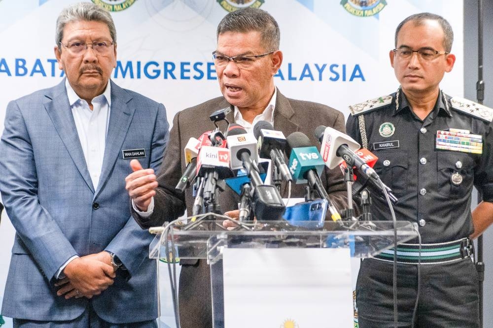 Home Minister Datuk Seri Saifuddin Nasution speaks during a press conference at the Immigration Department headquarter in Putrajaya December 9, 2022. — Picture by Shafwan Zaidon