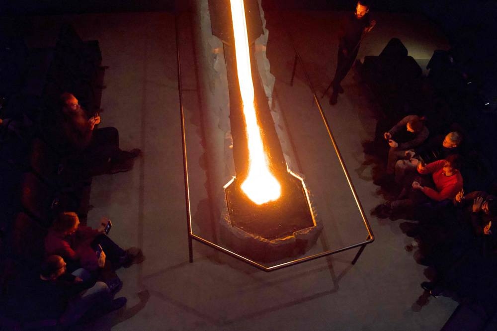 Real molten lava originated from tephra and that erupted in 1918 from the Katla Volcano in southern Iceland, cools down on the basalt structure at the Lava Show showroom in Reykjavik city center, Iceland, on December 1, 2022. — AFP pic