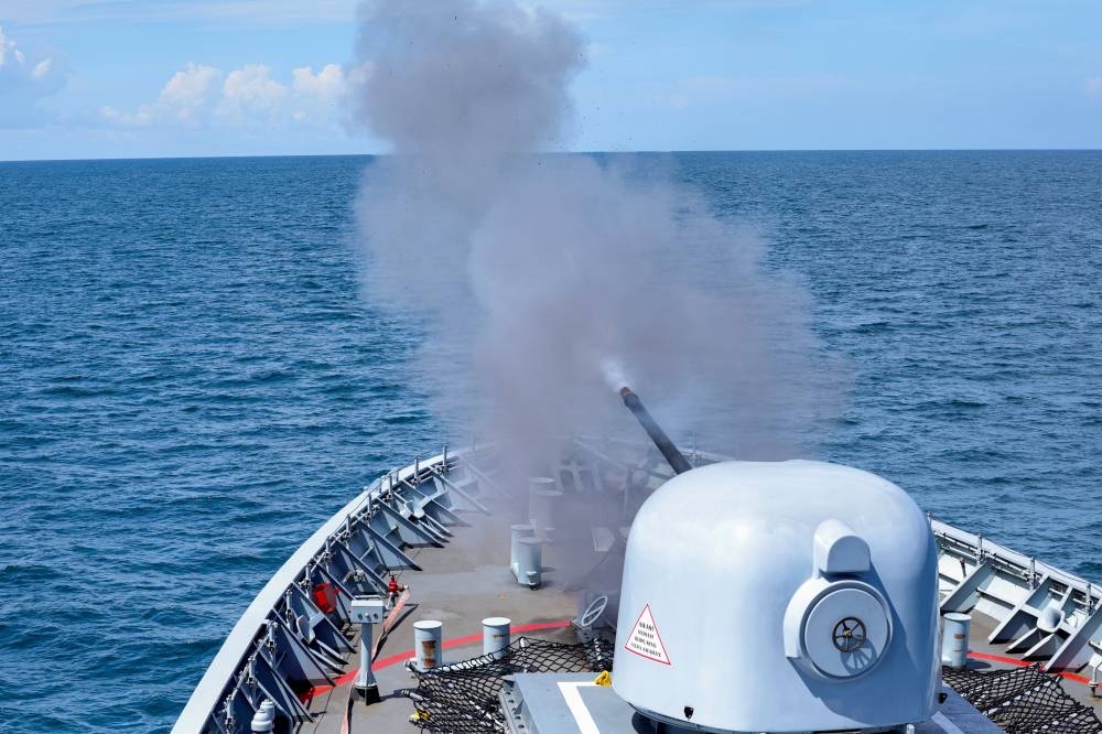 A Royal Malaysian Navy (RMN) vessel opens fire during the Operational Sea Training Exercise (Ostex) in the waters of Sandakan December 9, 2022. — Bernama pic