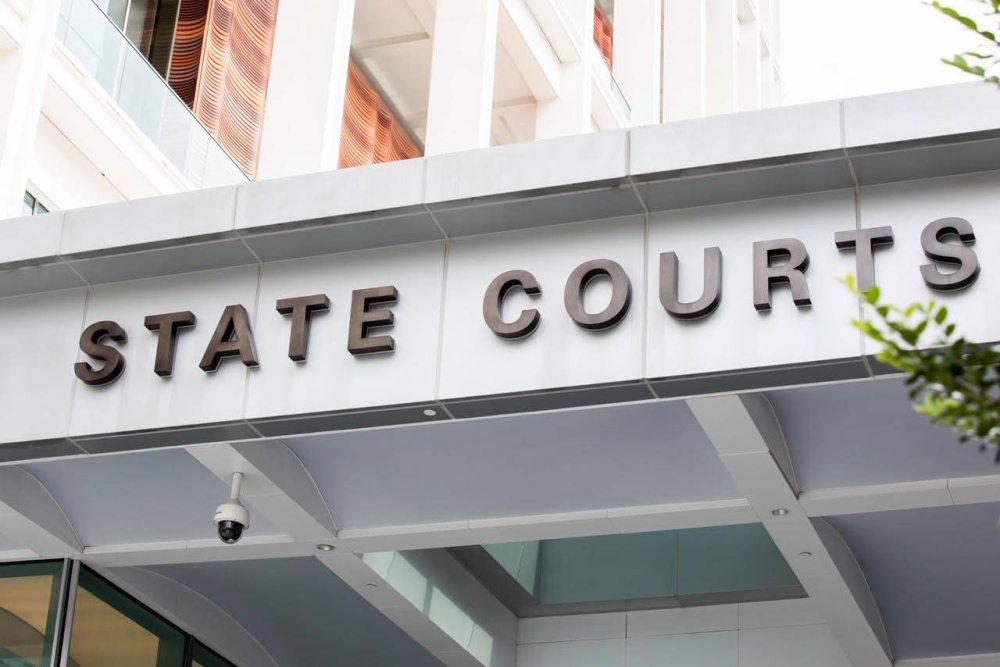 A former primary school teacher has been sentenced to two weeks’ jail by a district court today for possessing 7,786 obscene videos, which included those with child pornographic content. ― TODAY pic