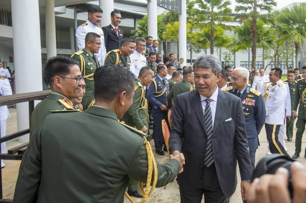 Defence Minister Datuk Seri Mohamad Hasan (right) attends the National Centre for Defence Studies graduation ceremony in Putrajaya December 10, 2022. — Picture by Shafwan Zaidon