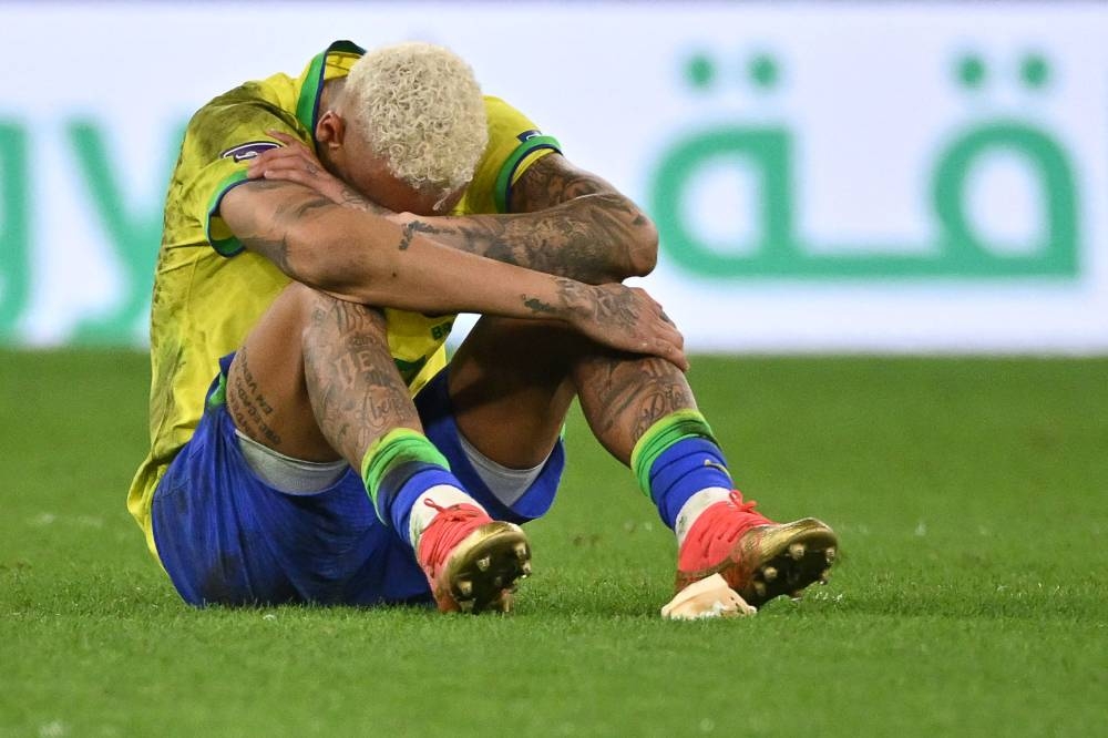 Brazil’s forward #10 Neymar reacts after his team lost the Qatar 2022 World Cup quarter-final football match between Croatia and Brazil at Education City Stadium in Al-Rayyan, west of Doha, on December 9, 2022. — AFP pic