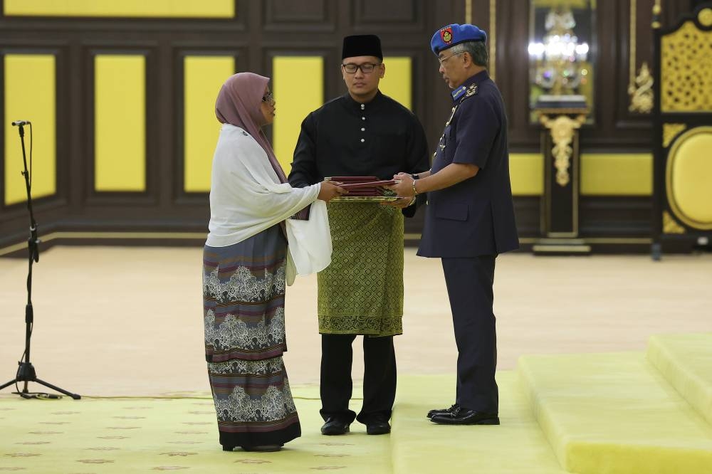 Amanah Wanita chief Aiman Athirah Sabu is sworn in as the Deputy Minister of Women, Family and Community Development before the Yang di-Pertuan Agong Al- Sultan Abdullah Ri’ayatuddin Al-Mustafa Billah Shah at Istana Negara December 10, 2022. — Bernama pic