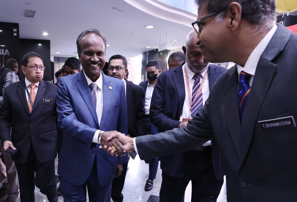 Human Resources Minister V. Sivakumar greets staff on his first day at work in Putrajaya December 6, 2022. — Bernama pic