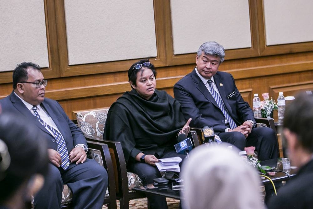 Datuk Seri Azalina Othman (centre) speaks during a press conference at the Royale Chulan Hotel December 12, 2022. — Picture by Hari Anggara