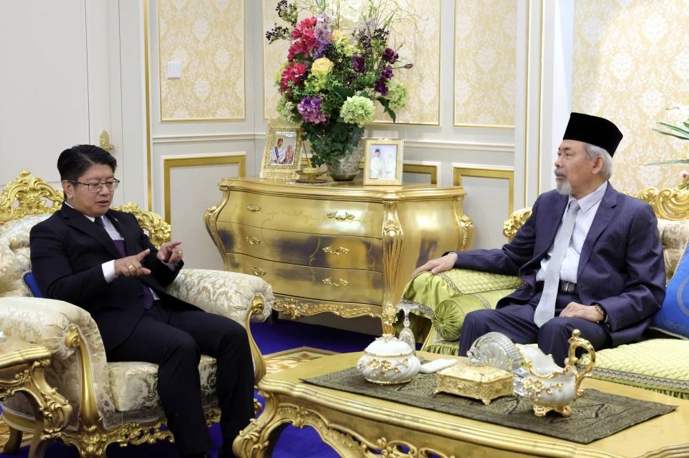 Entrepreneur Development and Cooperatives Minister Datuk Ewon Benedick (left) pays a courtesy call on Sabah Yang Dipertua Negeri Tun Juhar Mahiruddin (right) at Istana Seri Kinabalu in Kota Kinabalu December 12, 2022. — Bernama pic