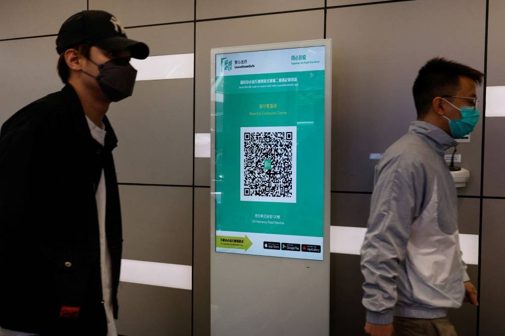 A QR code for the ‘LeaveHomeSafe’ COVID-19 contact-tracing app is seen inside a shopping mall in Hong Kong December 13, 2022. — Reuters pic