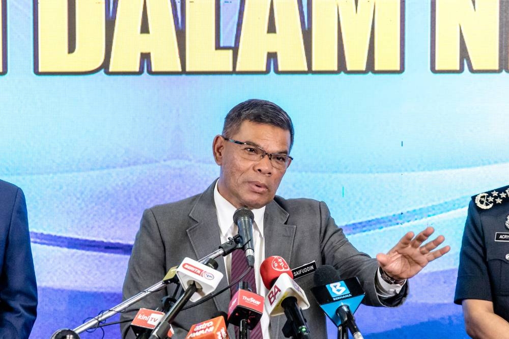Home Minister Datuk Seri Saifuddin Nasution Ismail speaks during a press conference at Bukit Aman in Kuala Lumpur December 13, 2022. — Picture by Firdaus Latif