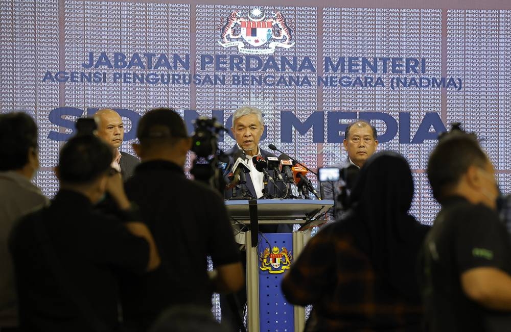 Deputy Prime Minister Datuk Seri Ahmad Zahid Hamidi speaks during a press conference after chairing the Central Disaster Management Committee meeting in Putrajaya December 13, 2022. — Bernama pic