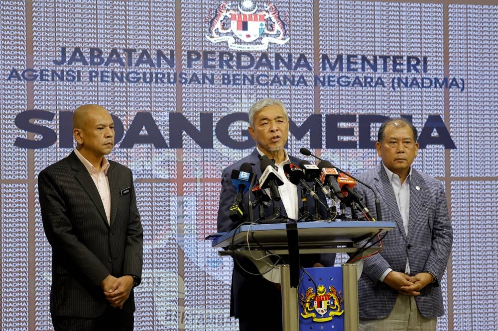 Deputy Prime Minister Datuk Seri Ahmad Zahid Hamidi speaks during a press conference after chairing the Central Disaster Management Committee meeting in Putrajaya December 13, 2022. — Bernama pic