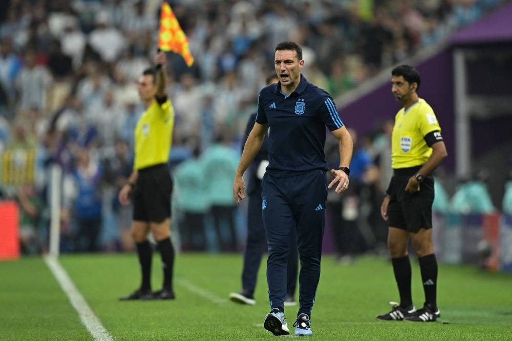 Argentina's coach Lionel Scaloni reacts on the touchline during the match against Croatia at Lusail Stadium in Lusail December 13, 2022. — AFP pic