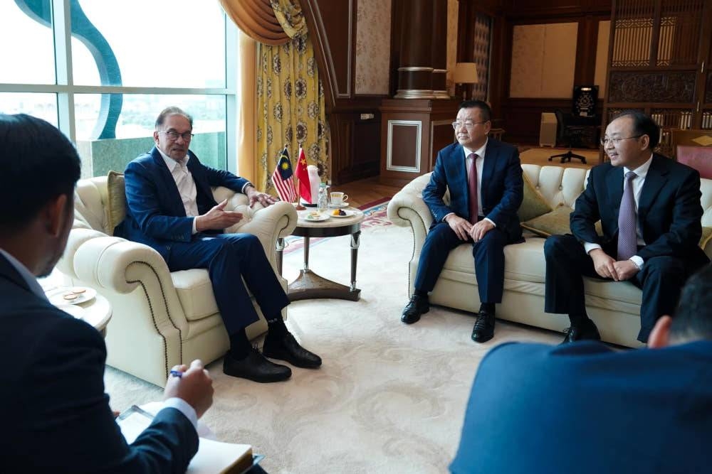 Prime Minister Datuk Seri Anwar Ibrahim receives a courtesy call from Ambassador of China, Ouyang Yujing and his delegation in Putrajaya, December 13, 2022. — Picture from Facebook/Anwar Ibrahim 