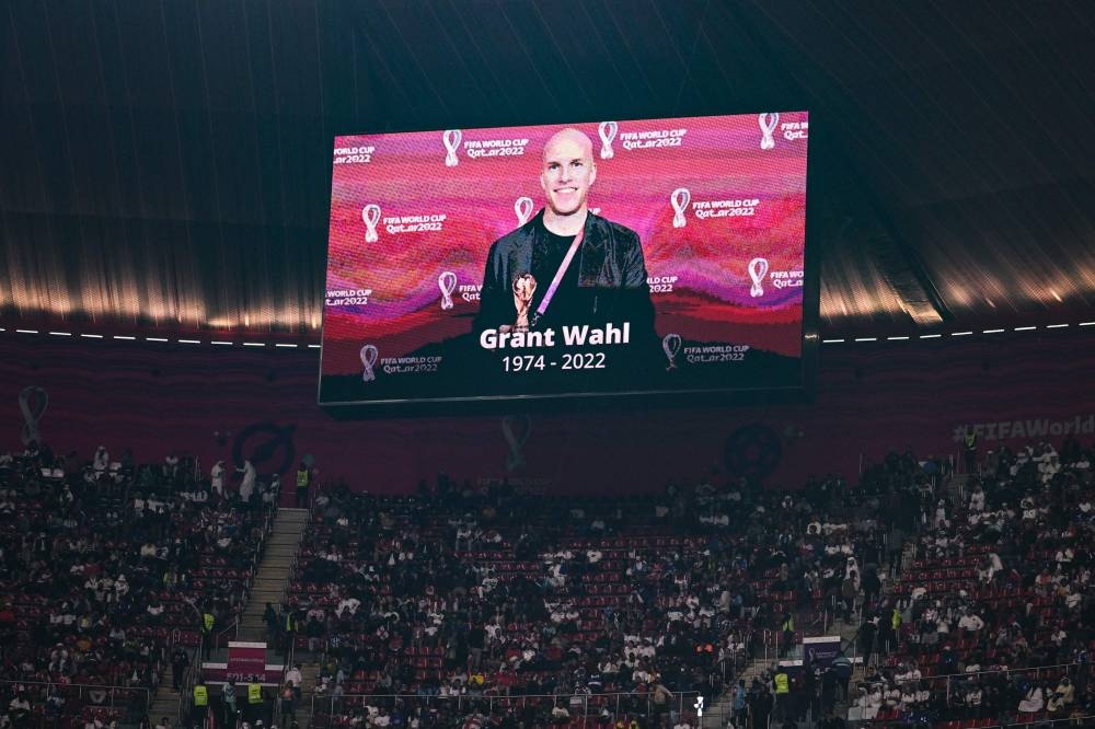 A giant screen displays a photo of US journalist Grant Wahl who died after he collapsed in the stadium’s press area while covering the match between Argentina and Netherlands at the Al-Bayt Stadium in Al Khor, north of Doha, December 10, 2022. — AFP pic 