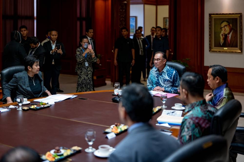 Prime Minister Datuk Seri Anwar Ibrahim attends a briefing at Bank Negara Malaysia, Kuala Lumpur, December 15, 2022. — Sadiq Asyraf/Prime Minister’s Office of Malaysia handout pic