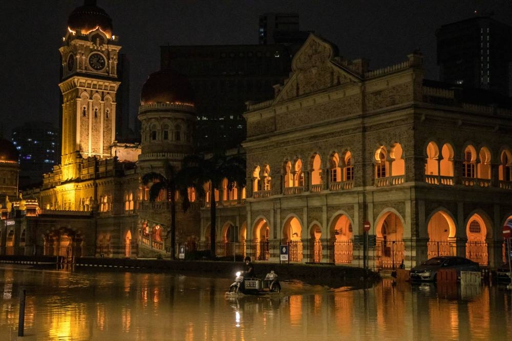 Dataran Merdeka submerged by floodwaters amid continuous rain in Kuala Lumpur back in December 19, 2021. — Picture by Firdaus Latif