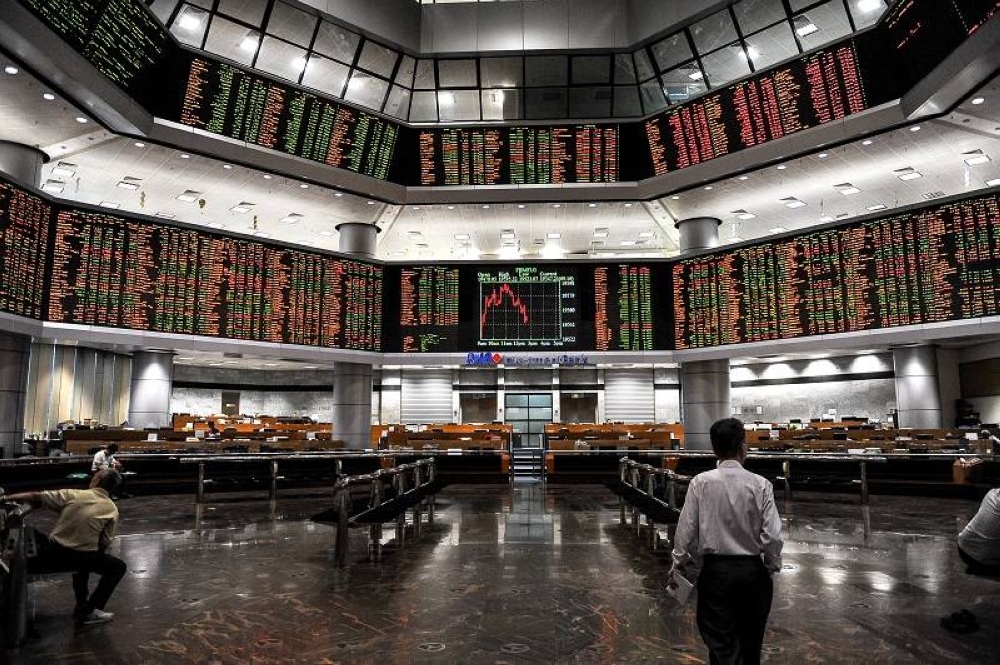 Bursa Malaysia ended the Friday morning trading session slightly lower amid market volatility. — Bernama pic