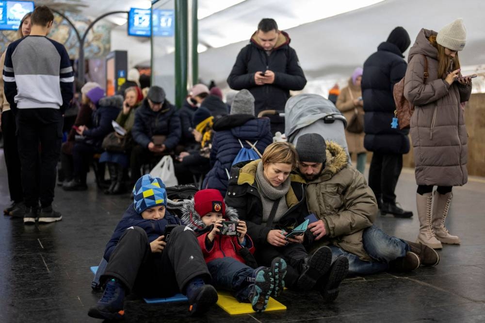 People shelter inside a metro station during massive Russian missile attacks in Kyiv, Ukraine December 16, 2022. — Reuters pic