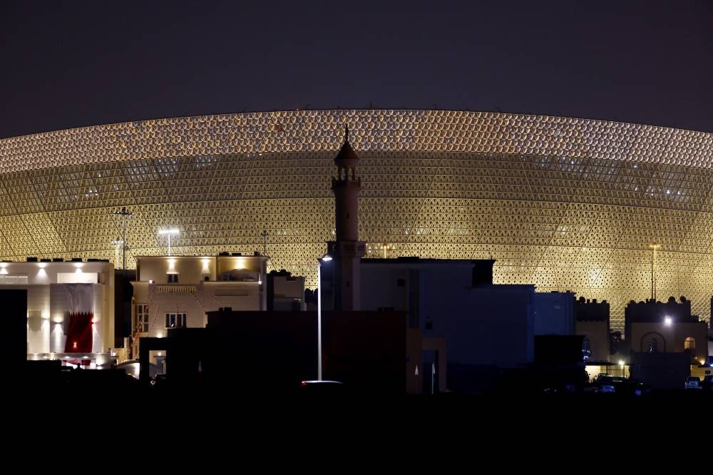 General view at night of the Lusail Stadium ahead of the final between Argentina and France. — Reuters pic