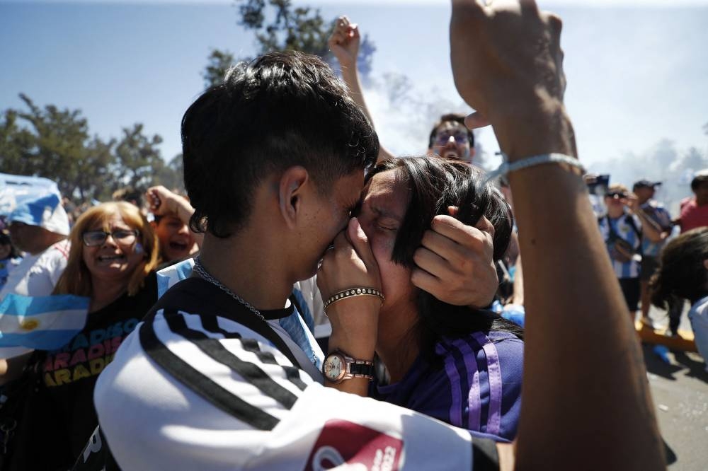Argentina fans celebrate winning the Qatar World Cup in Buenos Aires December 18, 2022. — Reuters pic 