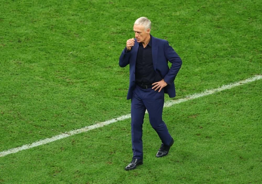 France coach Didier Deschamps looks dejected after the match against Argentina at the Lusail Stadium December 18, 2022. — Reuters pic