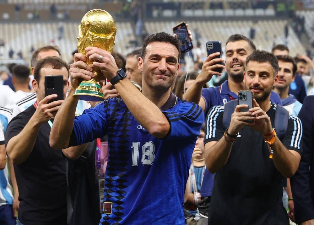 Argentina coach Lionel Scaloni celebrates winning the World Cup after the match against France at the Lusail Stadium December 18, 2022. — Reuters pic