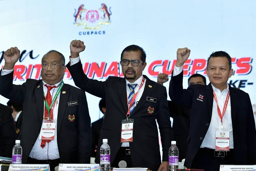 Datuk Adnan Mat has retained his position as president of the Congress of Unions of Employees in the Public and Civil Services (Cuepacs) after winning big in the 29th Triennial Convention election in Shah Alam December 19, 2022. — Bernama pic