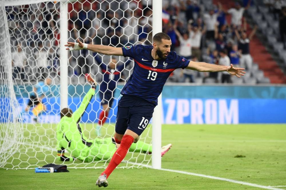 France's forward Karim Benzema celebrates after scoring a goal against Germany that is later revoked for offside at the Allianz Arena in Munich June 15, 2021. — AFP pic
