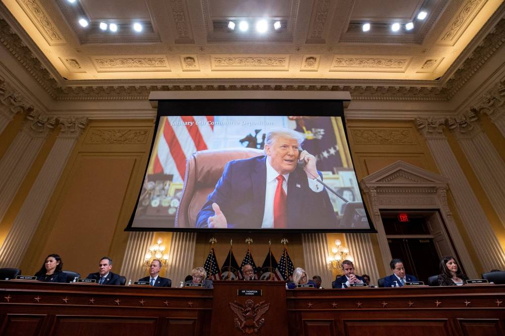 Former US president Donald Trump is displayed on a screen during a hearing of the Select Committee to investigate the January 6 attack on the US Capitol, in Washington December 19, 2022. ― Al Drago/Pool via Reuters