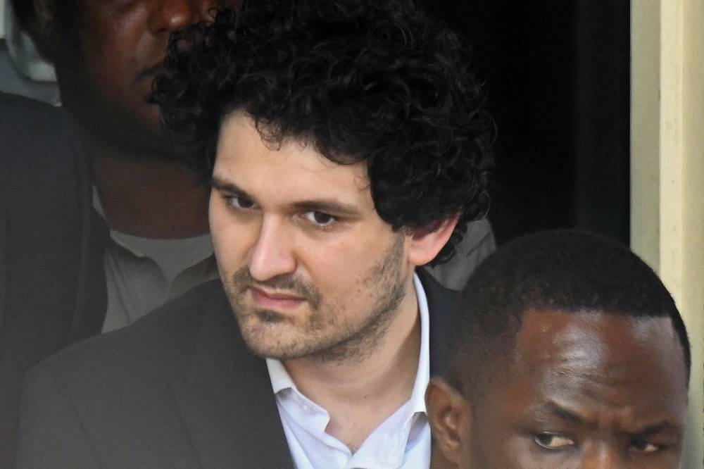 Sam Bankman-Fried, founder and former CEO of crypto currency exchange FTX, leaves the Magistrate Court building in Nassau, Bahamas December 19, 2022. — Reuters pic