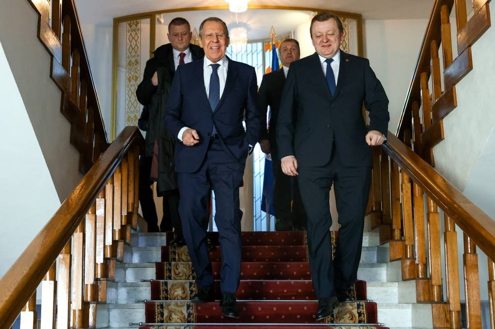 Russian Foreign Minister Sergei Lavrov (front, left) claimed the European Union had no plans to objectively investigate the Nord Stream attack. — Reuters pic