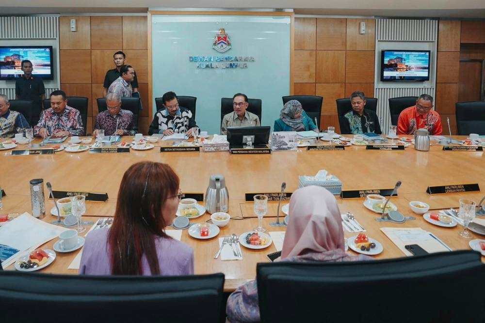 Prime Minister Datuk Seri Anwar Ibrahim in a meeting with all Members of Parliament (MPs) in the Federal Territory of Kuala Lumpur at Menara DBKL, December 22, 2022. — Picture from Facebook/Anwar Ibrahim  