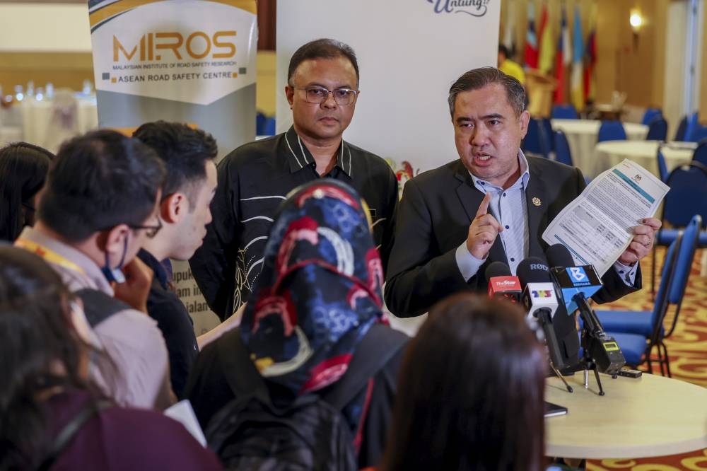 Transport Minister Anthony Loke speaks at a press conference after the road traffic safety management system empowerment programme in Putrajaya, December 22, 2022. — Bernama pic 