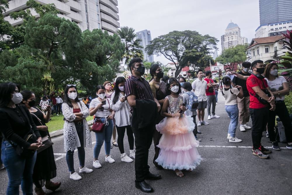 Christians attending Christmas mass at the Cathedral Of St. John the Evangelist, Kuala Lumpur December 25, 2022. — Picture by Hari Anggara